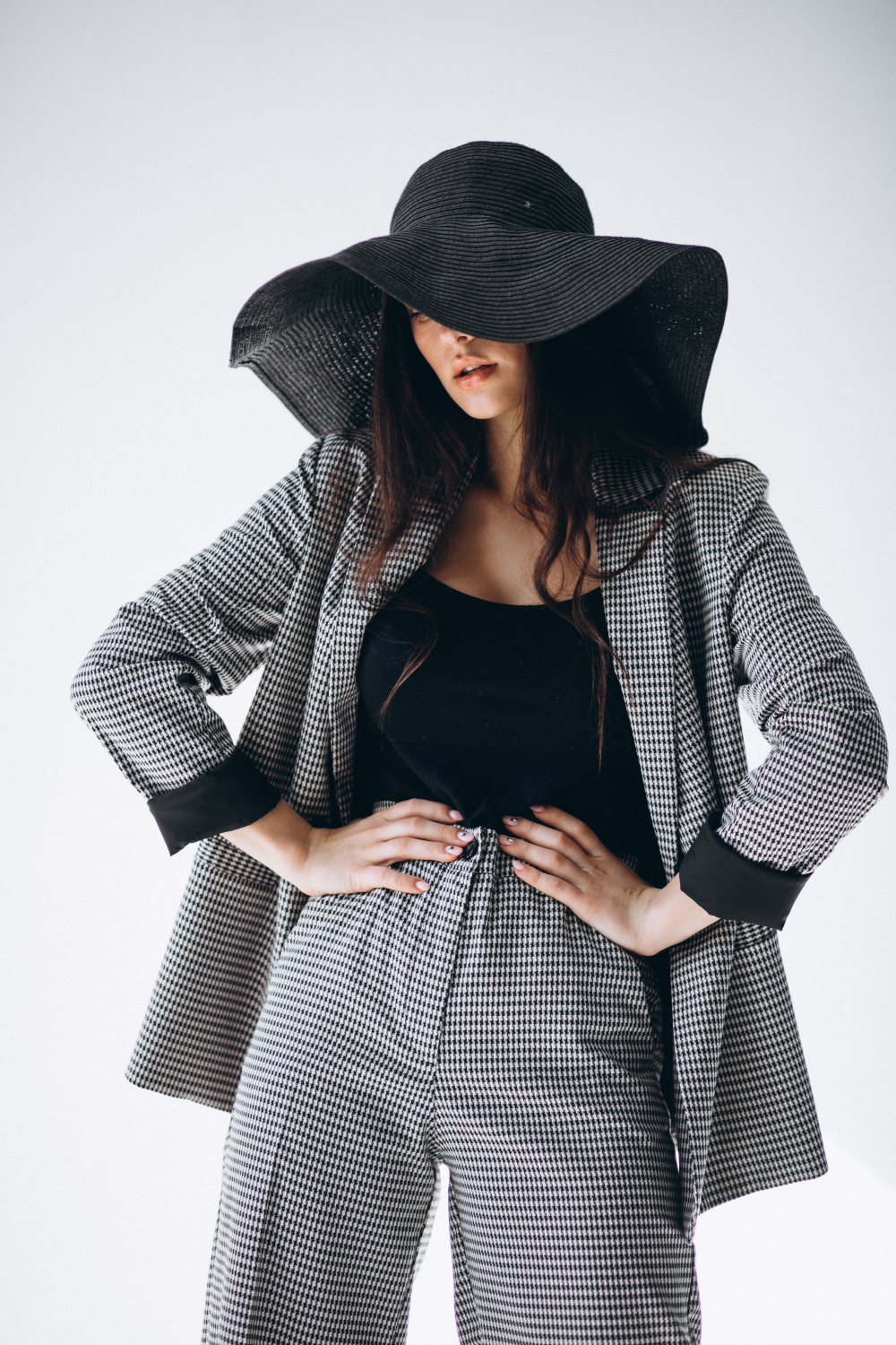 young-woman-business-suit-wearing-hat